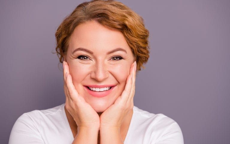 Woman Holding Refreshed Face